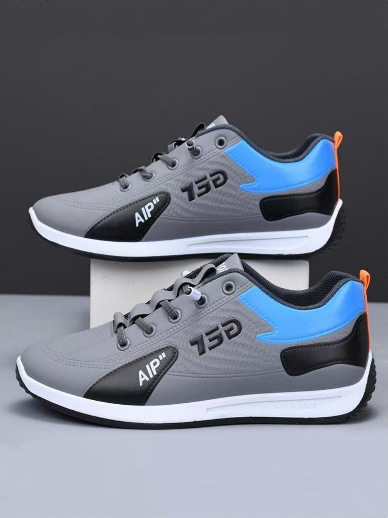 Men's casual sports shoes, simple splicing design for breathability and comfort, contrasting tongue and eye-catching letter logo for fashionable embellishment, ideal for light commuting and sports wear