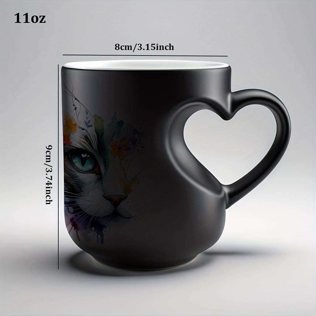 Playful Watercolor Cat Flower Decor: A vibrant artistic depiction set in a color-changing ceramic mug that changes color with temperature and features a heart-shaped handle. Perfect for coffee, this 11oz/330ml mug makes a wonderful Christmas gift
