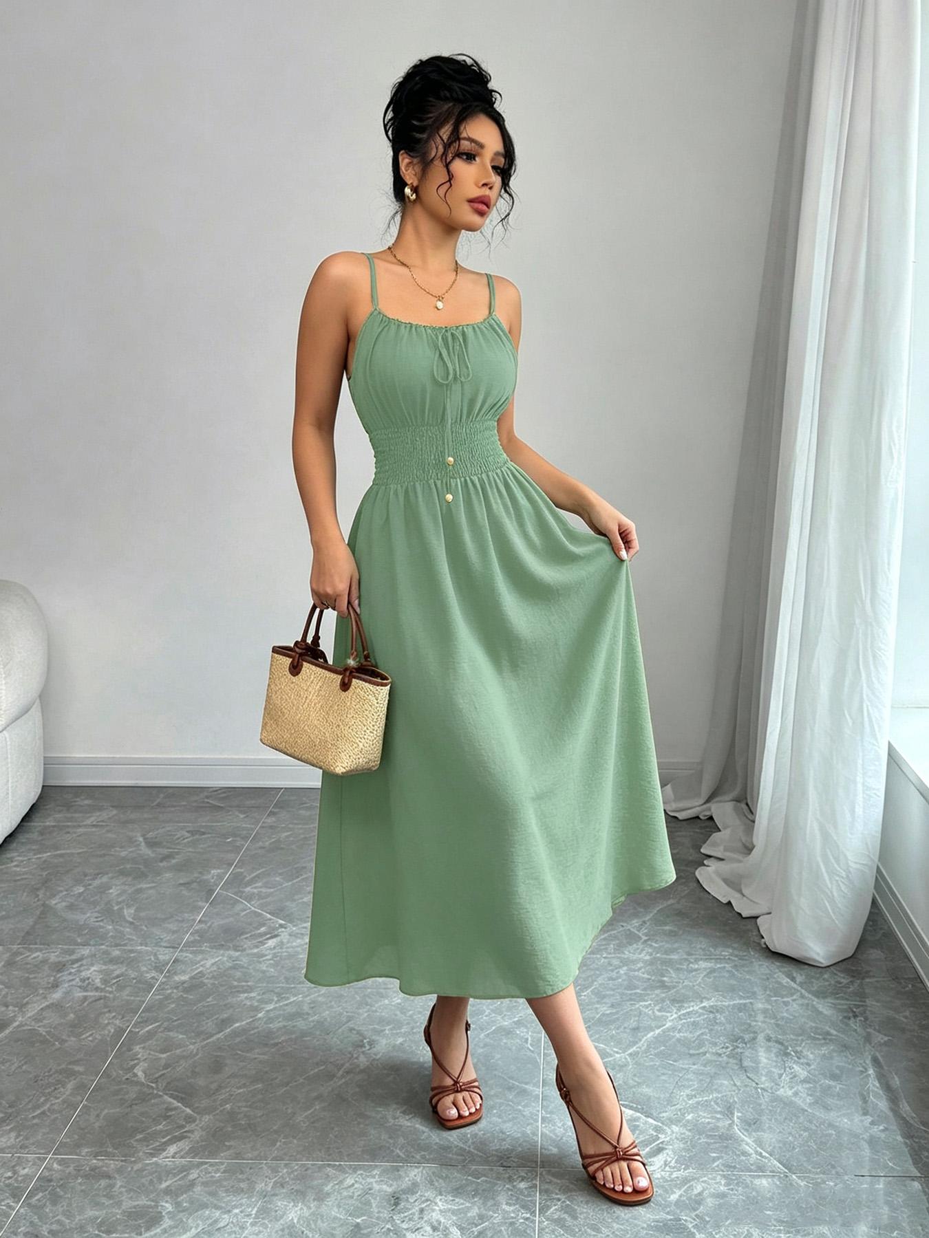 A women's fashionable and high-end French gentle style waist cinching spaghetti strap camisole dress with lace up bead design, suitable for summer, beach wear, dates, dinners, and travel Straps Summer Dress