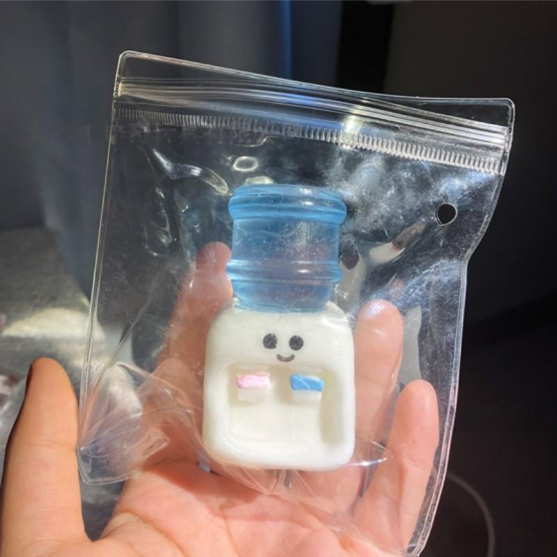 Cute Simulation Drinking Machine, a squeezable sensory toy with a soft, bouncy texture. Perfect for stress relief in various settings, a fun social icebreaker, and a creative desktop decoration.