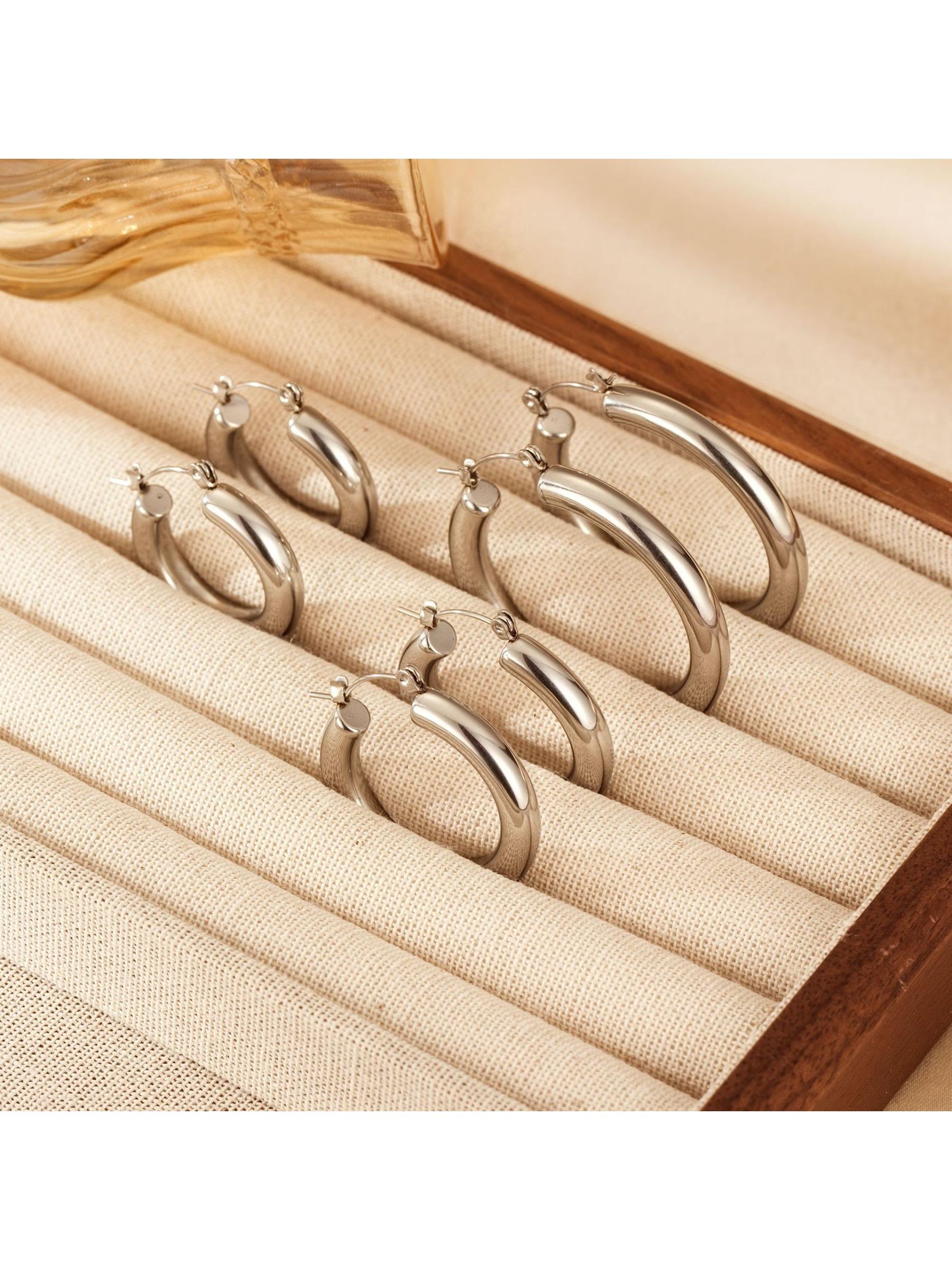 Bestselling minimalist and personalized titanium steel hoop earrings for both men and women, 4mm hollow gold-plated shiny earrings