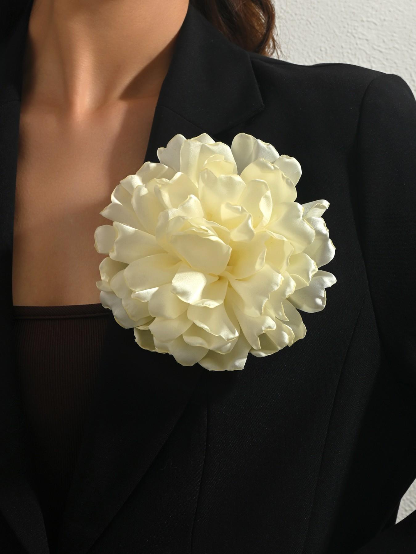 A handcrafted, multi-layered, and multicolored fabric floral brooch featuring a unique, elegant banquet-style design. This versatile corsage—equipped with a convenient duckbill clip—can be worn in various ways and is suitable for any occasion