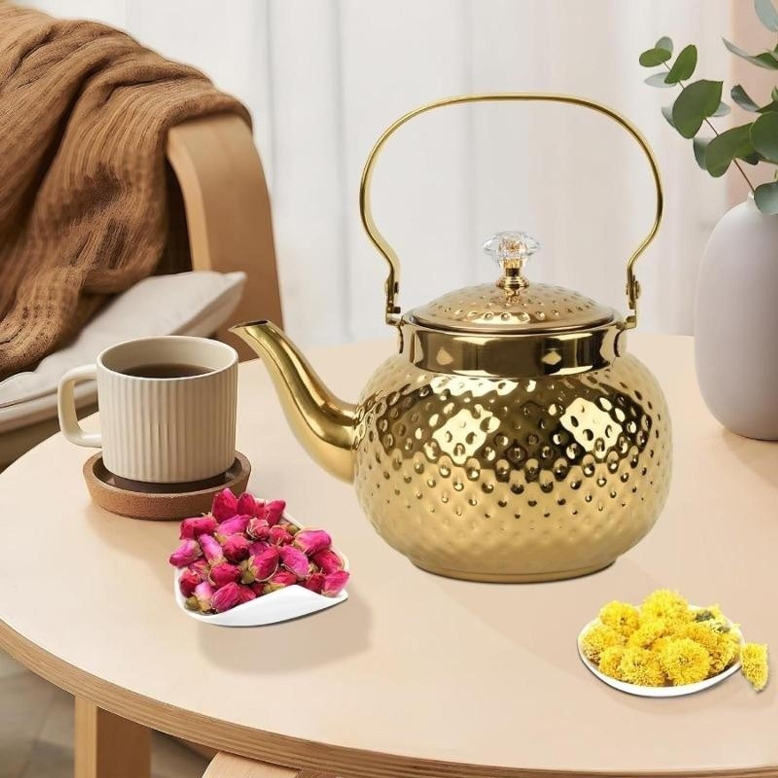 A Middle Eastern hammered design stainless steel teapot - heavy-duty 201 stainless steel with a filter, suitable for use on induction cooktops/gas stoves, oven-safe for both home and restaurant use Teapot With Strainer