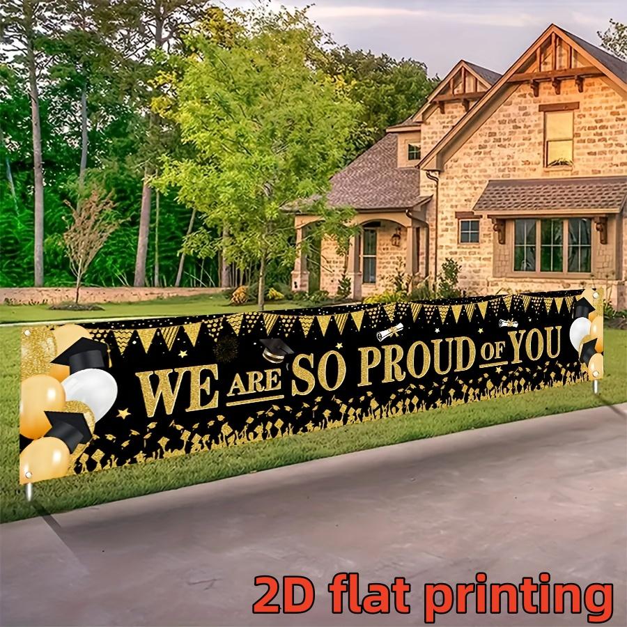 2D flat banner, 1 black gold graduation season banner We Are So Proud Of You Graduation party decoration background cloth European and American graduation ceremony courtyard layout Bachelor's hat balloon photo background wall Graduation Banner