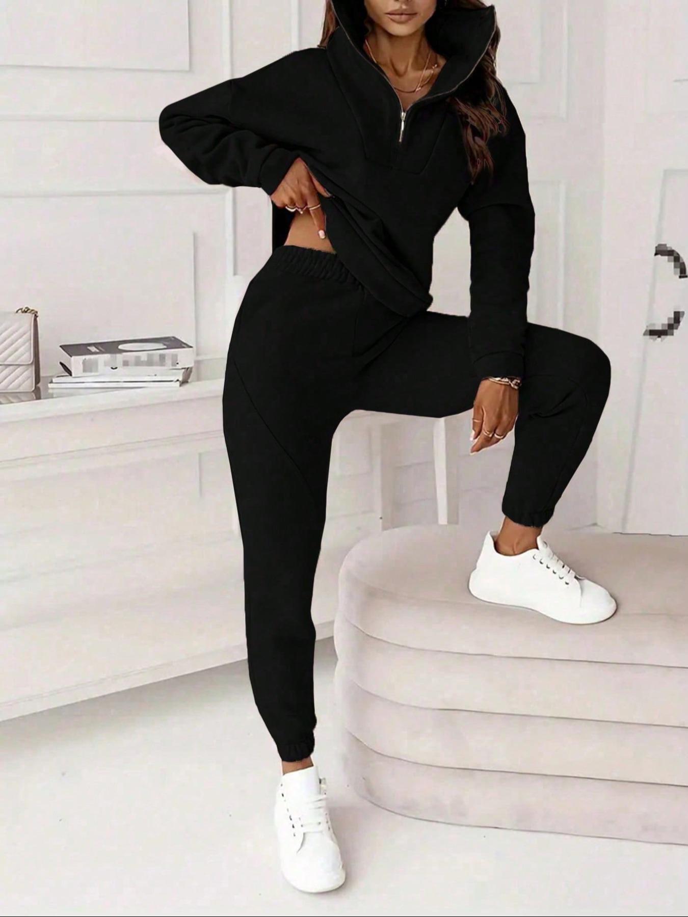 Two-piece women's solid-color crew-neck pullover with long sleeves and elastic waist and loose-fitting bottom pants, perfect for all occasions and versatile in style.