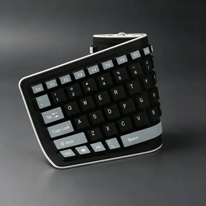 Dustproof, portable, foldable silicone silent keyboard with 103 keys, USB plug-and-play design, and rollable construction; suitable for home/office desktops and laptops.