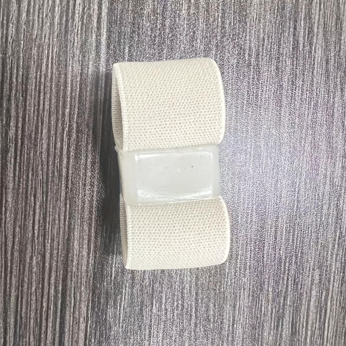 Two-hole fabric bunion corrector, toe separator pad, foot care insole