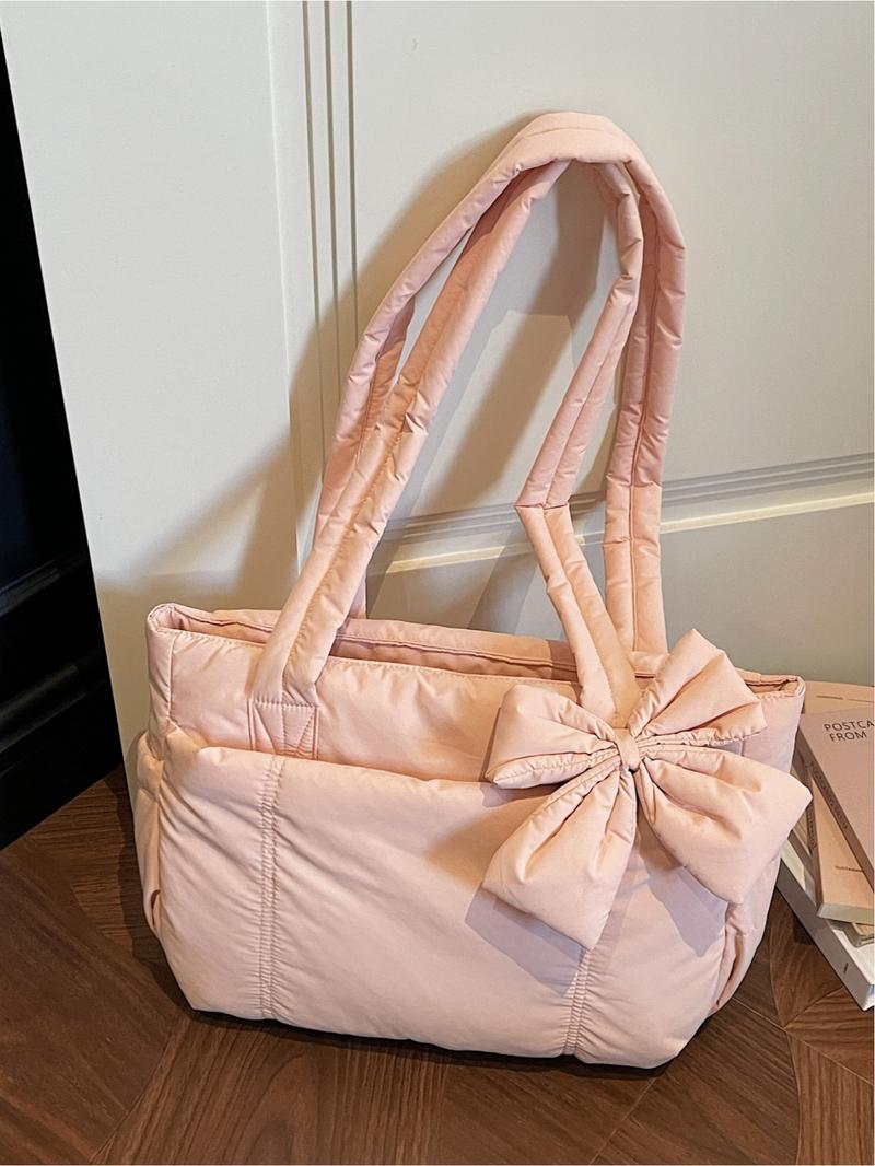 Pink quilted bow tote bag, a gentle, casual, lightweight, and spacious shoulder bag, Casual commuter bag, suitable for commuting, shopping, leisure outings, and everyday accessories.