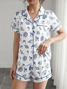 Women's Nautical Seashell & Starfish Print Pajama Set, Short Sleeve Button Down 2-Piece Loungewear, Cute Blue Ocean Themed Sleepwear with Bow Details，Cute Ocean Vibe Sleepwear for Summer， Sleepwear for Lazy Days