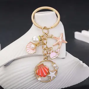 1pc Chic Dolphin Seashell Starfish Keychain, Alloy Summer Beach Marine Life Key Ring, for Car Keys, Backpacks, Wallets
