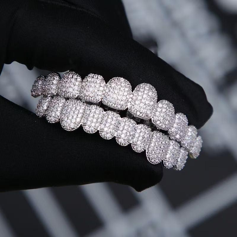 Hip-hop style - teeth with tiny diamonds embedded in the braces. Dental accessories, jewelry in the air, a gift.