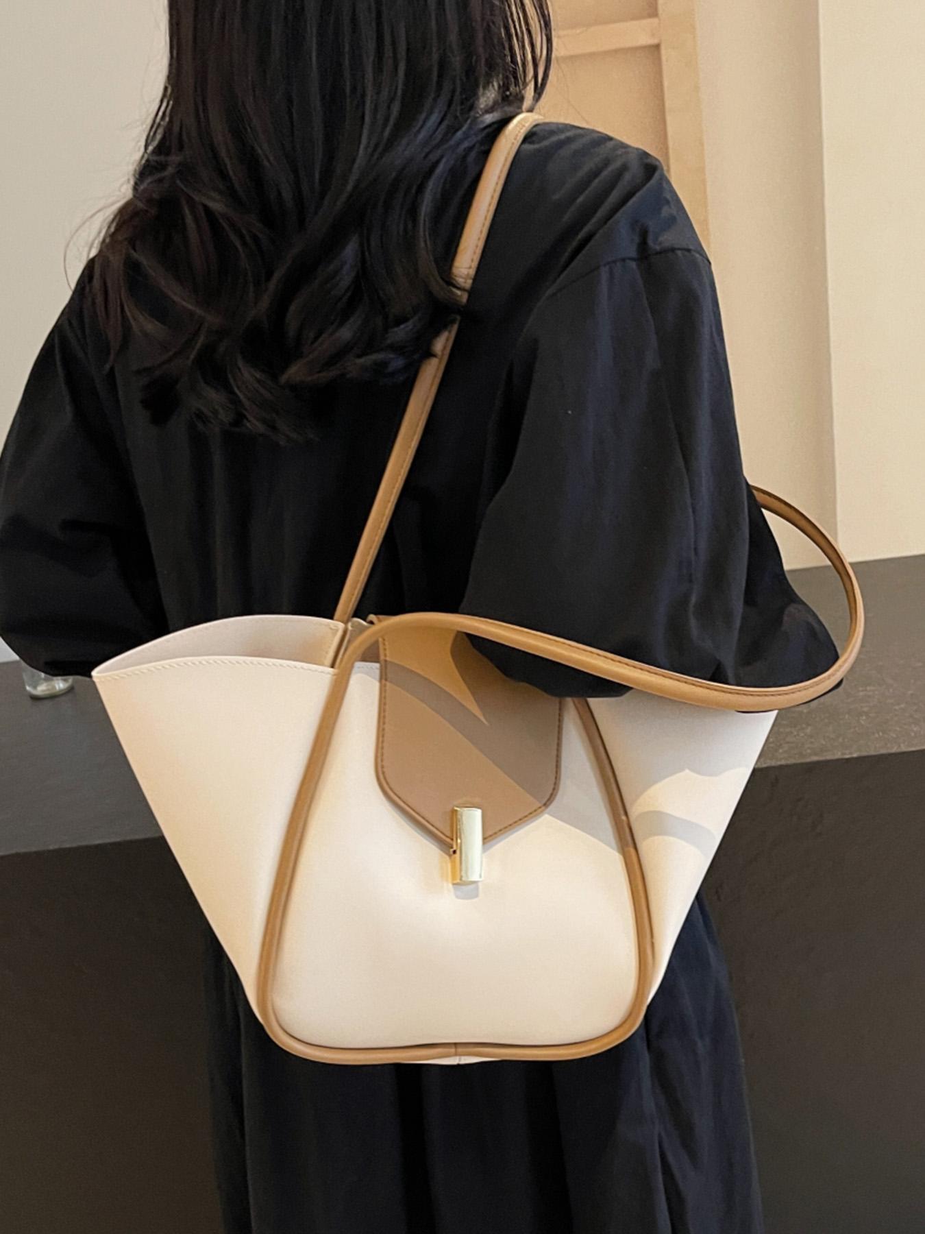 A niche and elegant shopping basket tote bag, a lock-button underarm bag, a simple solid color shoulder bag, a fashionable and textured shoulder commuter bag, a Casual Commuter Bag, suitable for daily matching, commuting and other scenarios