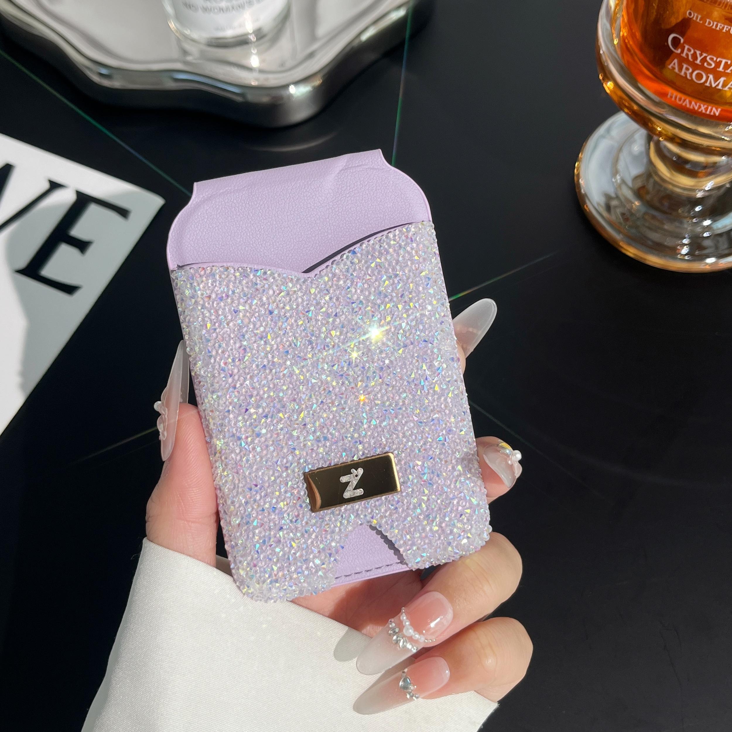 Strong magnetic anti-lost diamond phone holder with card holder and mirror. Lightweight and portable. Strong magnetic absorption of mobile phones. Can hold credit cards and ID cards. Suitable for magnetic mobile phones and magnetic mobile phone cases.