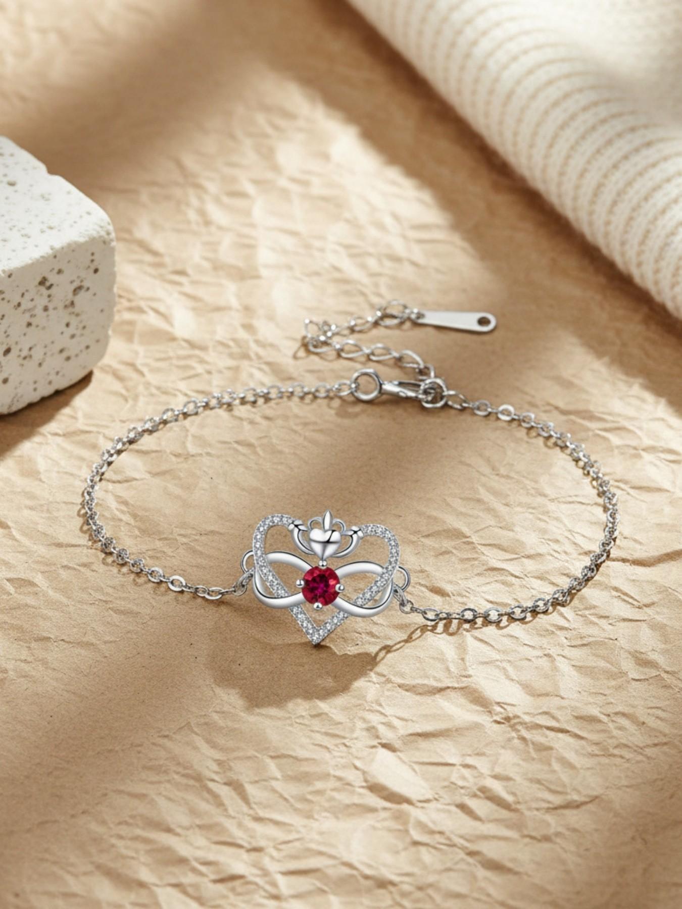 Heart Crown Queen · Ruby Bracelet Unique premium heart bracelet with delicate zircon infinity symbol, elegant and versatile.Comes with a card for Mom or daughter.Perfect mysterious gift for your daughter and ideal for Mother’s Day.
