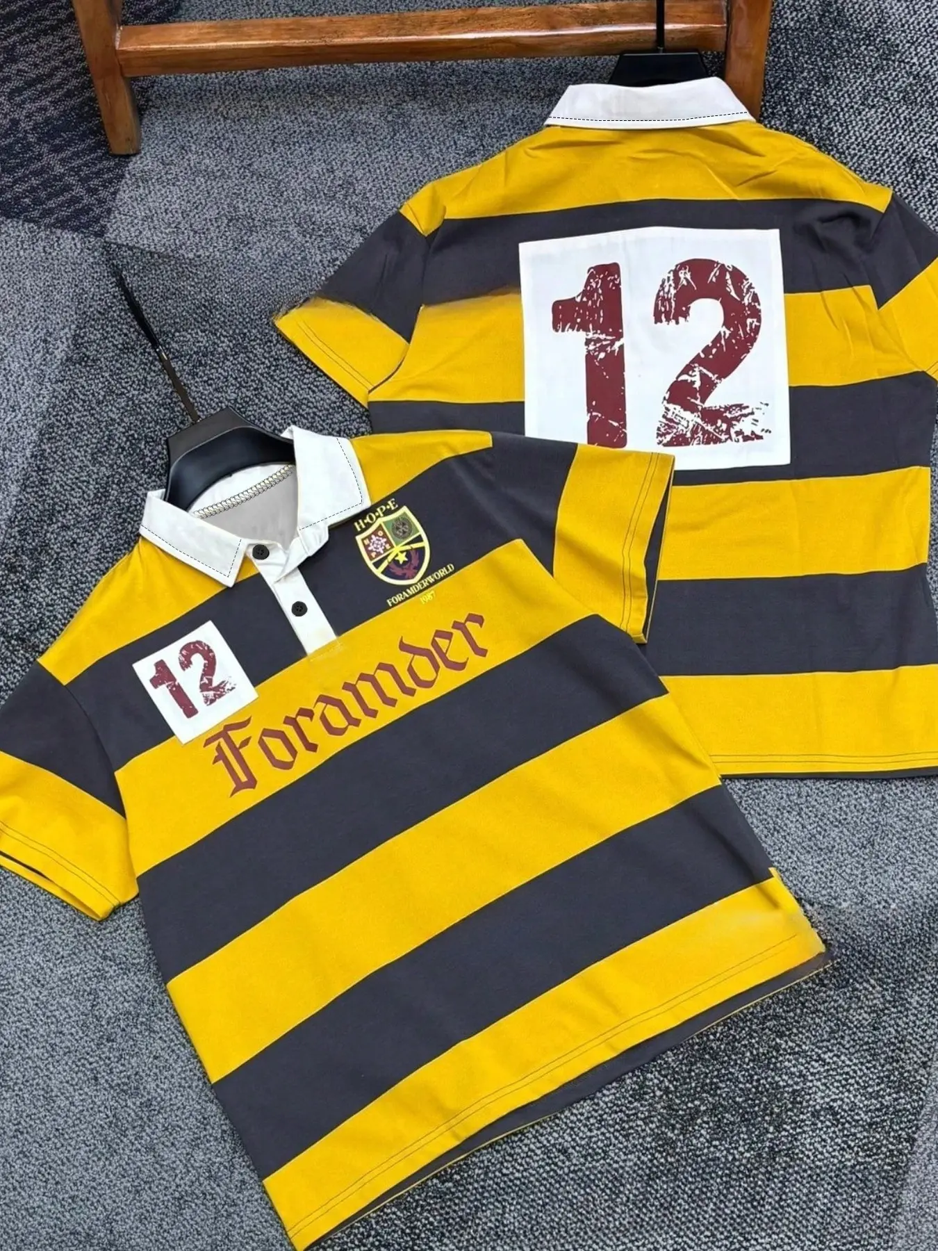 Men's Short-Sleeve Rugby Polo Shirt Featuring a Vintage-Style Striped Design, a Badge, and a "12" Print; a Loose-Fitting Collared Top Perfect for Everyday Millennial Streetwear Style.