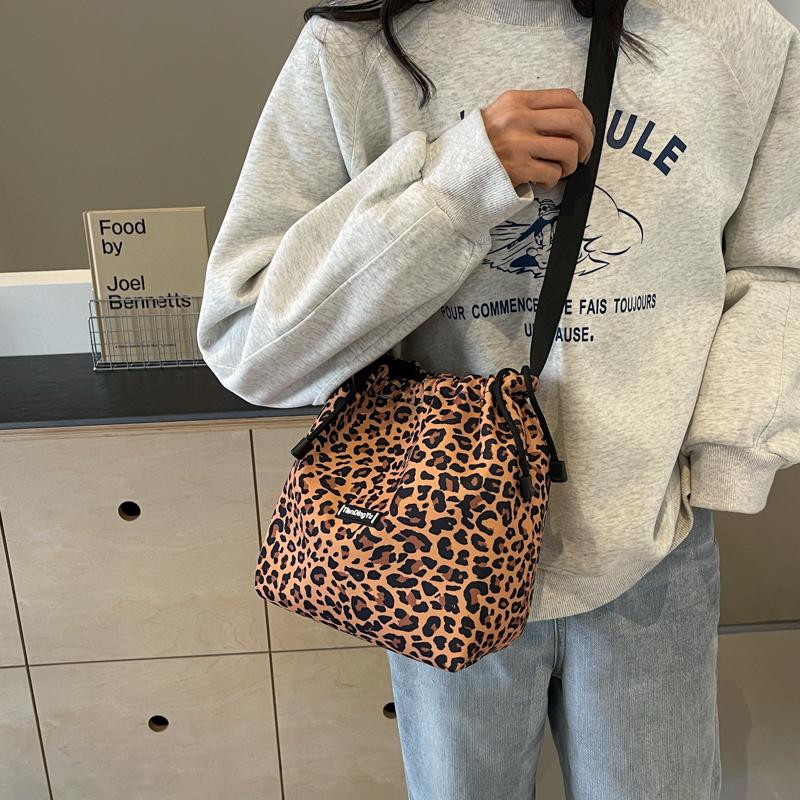 Women's Leopard Print Drawstring Bucket Bag, Lightweight Nylon Crossbody Shoulder Purse, Adjustable Strap, Casual All-Season Handbag