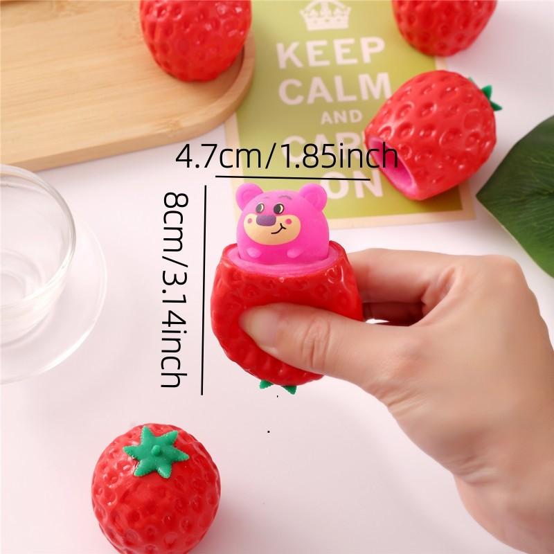 Realistic Strawberry Squeeze Toy — give it a squeeze and a cute little bear pops out 🍓🐻! An ultra-bouncy, squeezable sensory stress-relief toy, perfect for parent-child interaction and a great icebreaker for social gatherings.