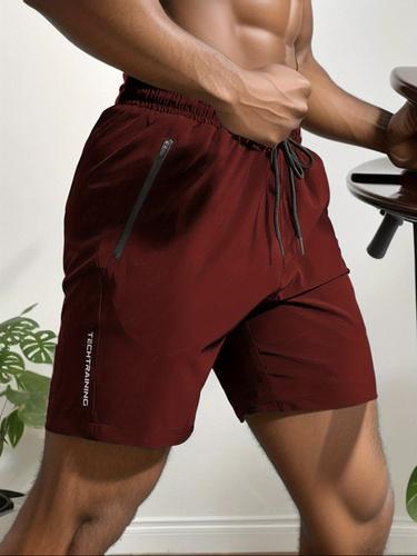Men's Quick Drying Breathable Shorts with Reflective Letters Logo Regular Fit Casual Comfy Polyester Drawstring Waist Zipper Closure Pockets for Summer Sports & Daily Wear Please refer to the size chart before purchasing mens  gym  shorts sport yoga short