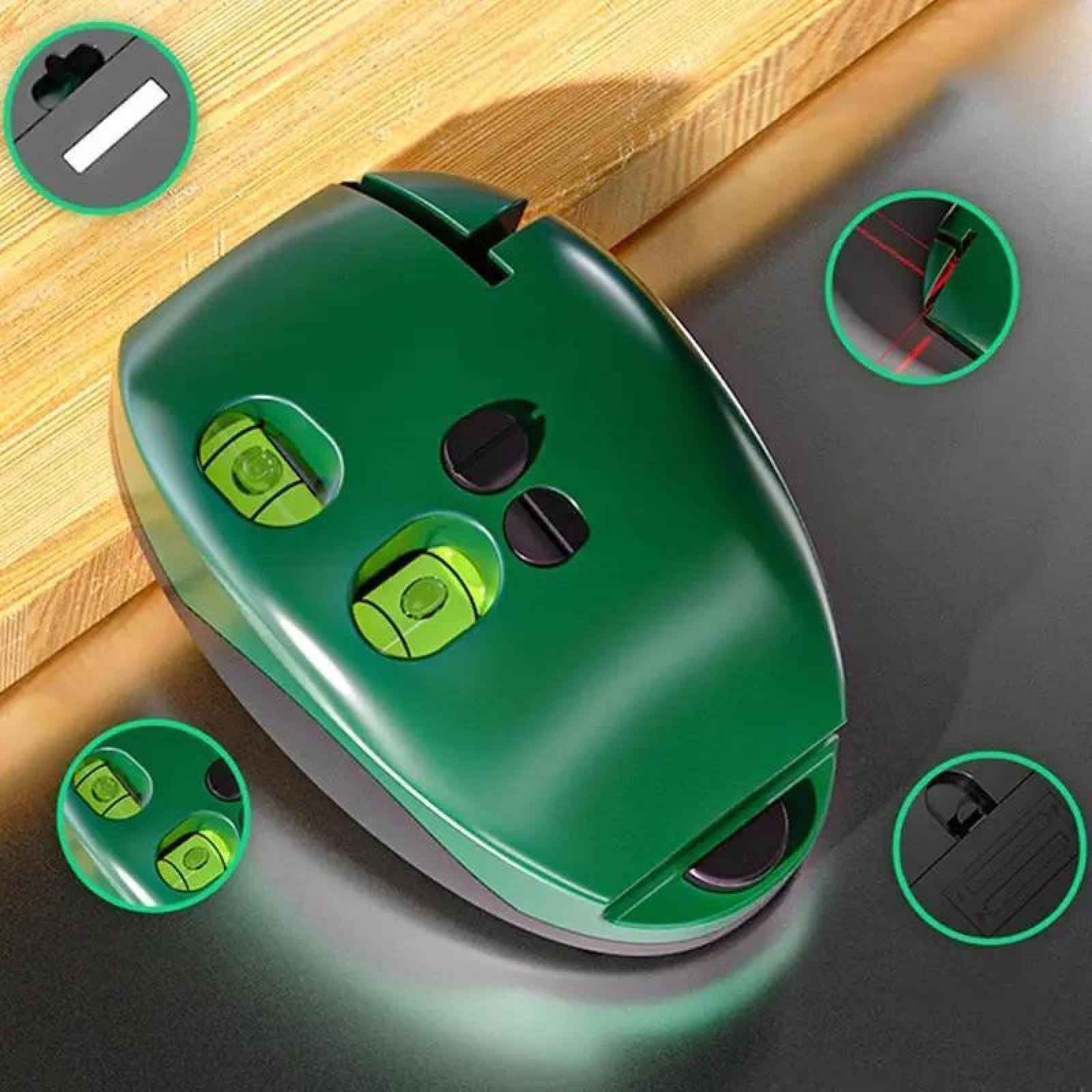 Close-up of compact green laser level housing and controls