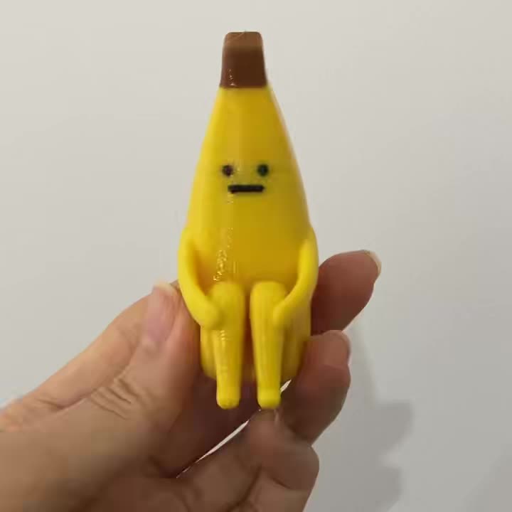 A 3D-printed "Anxious Banana" ornament, crafted from durable plastic—perfect for use as a home tabletop display, office decor, or a unique decorative accent.