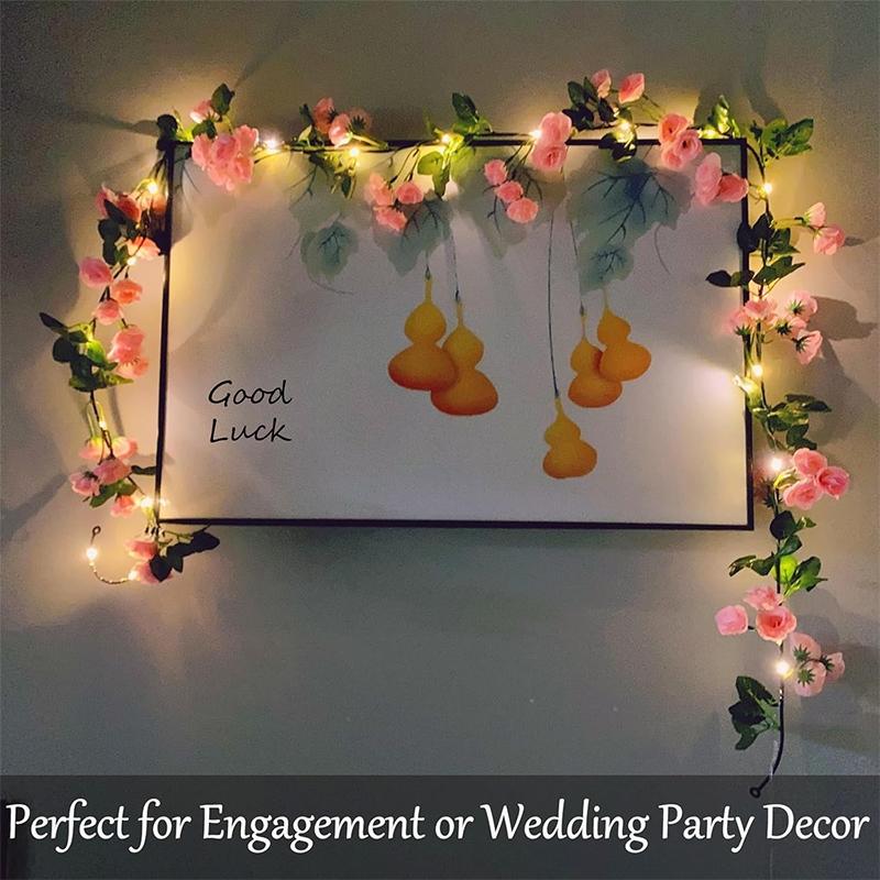 One artificial flower string light, battery-powered simulated rose vine wreath light, 69 heads with 20 LEDs, silk hanging pink rose vine, suitable for weddings, parties, gardens, Christmas, Valentine's Day decorations.
