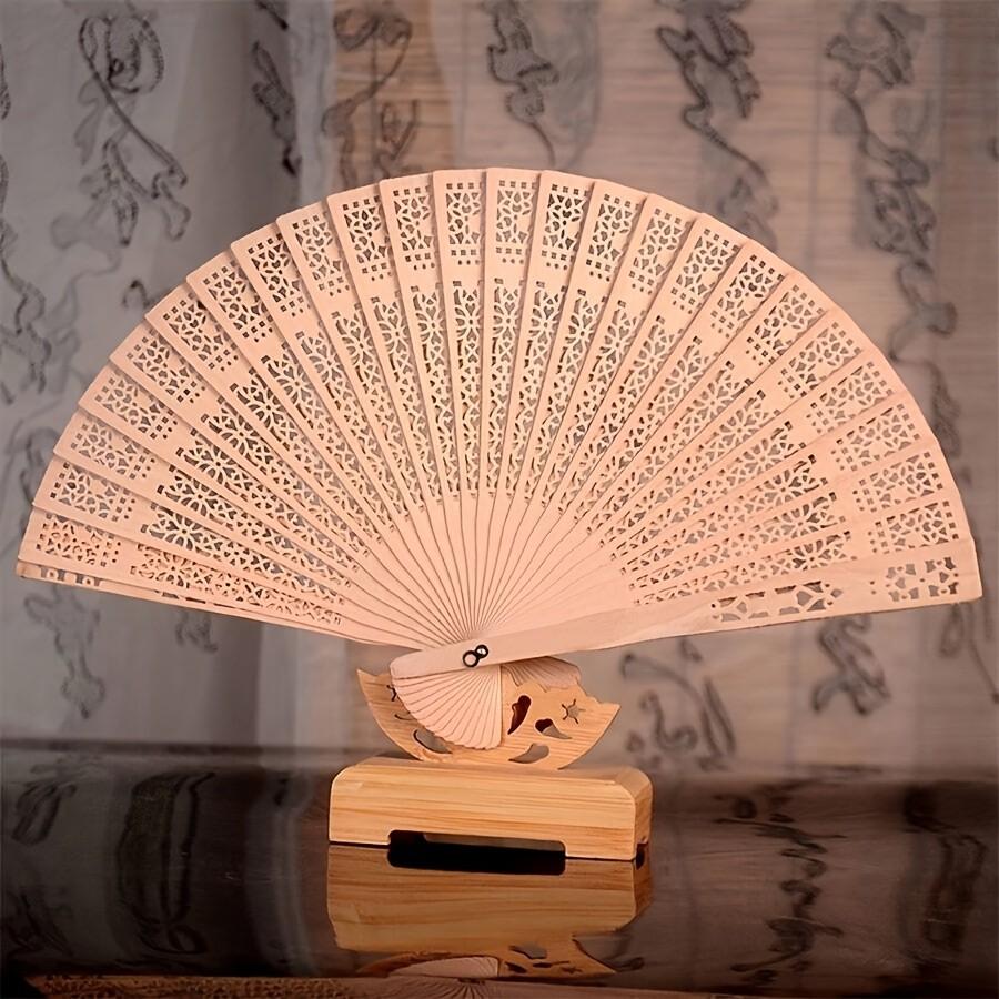 1PC Fashion Wooden Folding Fan – Hollow Carved Bamboo Hand Fan, Bohemian Style, Lightweight Portable Photography Prop, Perfect Graduation Gift for Women & Home Decor Accessory