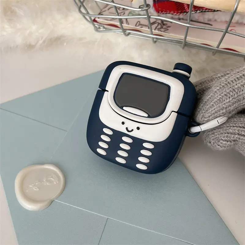 The button phone is suitable for Bluetooth headset protective case, and the personality is cute. Bluetooth headset case.