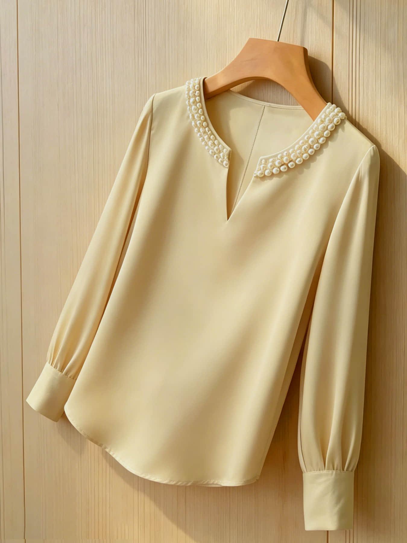 A women's pearl collar top, Blouse, with a V-neck small open neck, loose and versatile, showing off a slimming temperament. It is suitable for summer, business negotiations, customer meetings, commuting