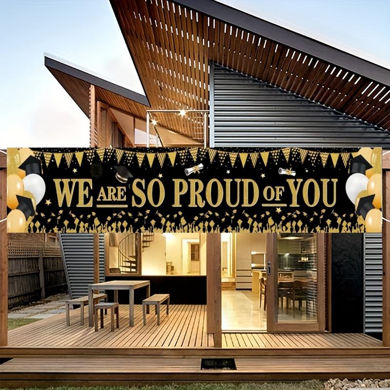 2D flat banner, 1 black gold graduation season banner We Are So Proud Of You Graduation party decoration background cloth European and American graduation ceremony courtyard layout Bachelor's hat balloon photo background wall Graduation Banner