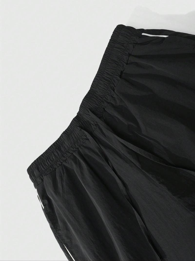 This men's two-piece Athletic Tracksuit Set includes a turtleneck jacket and sweatpants, featuring a striking blue and black color-block design with a unique sheen. Suitable for outdoor activities and casual wear, it also makes a great holiday gift.