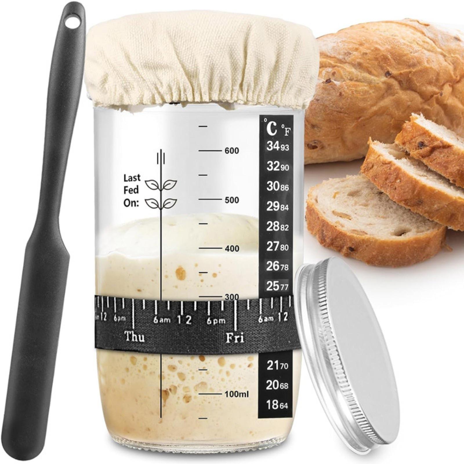 Bread fermentation jar, labeled feeding belt, thermometer, scraper, cloth cover and silicone cover/base, glass container, baking supplies