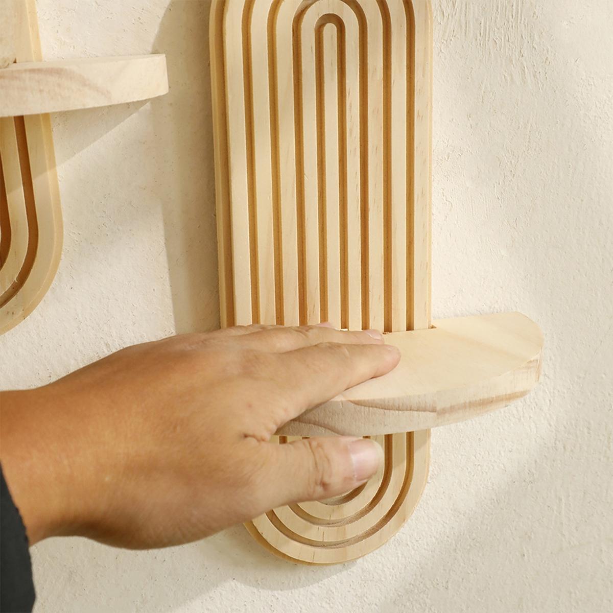 The log-colored wall-mounted shelf features a natural wood design, serving both storage and display purposes in living rooms and bedrooms, effortlessly adding a touch of natural artistry to your living space.