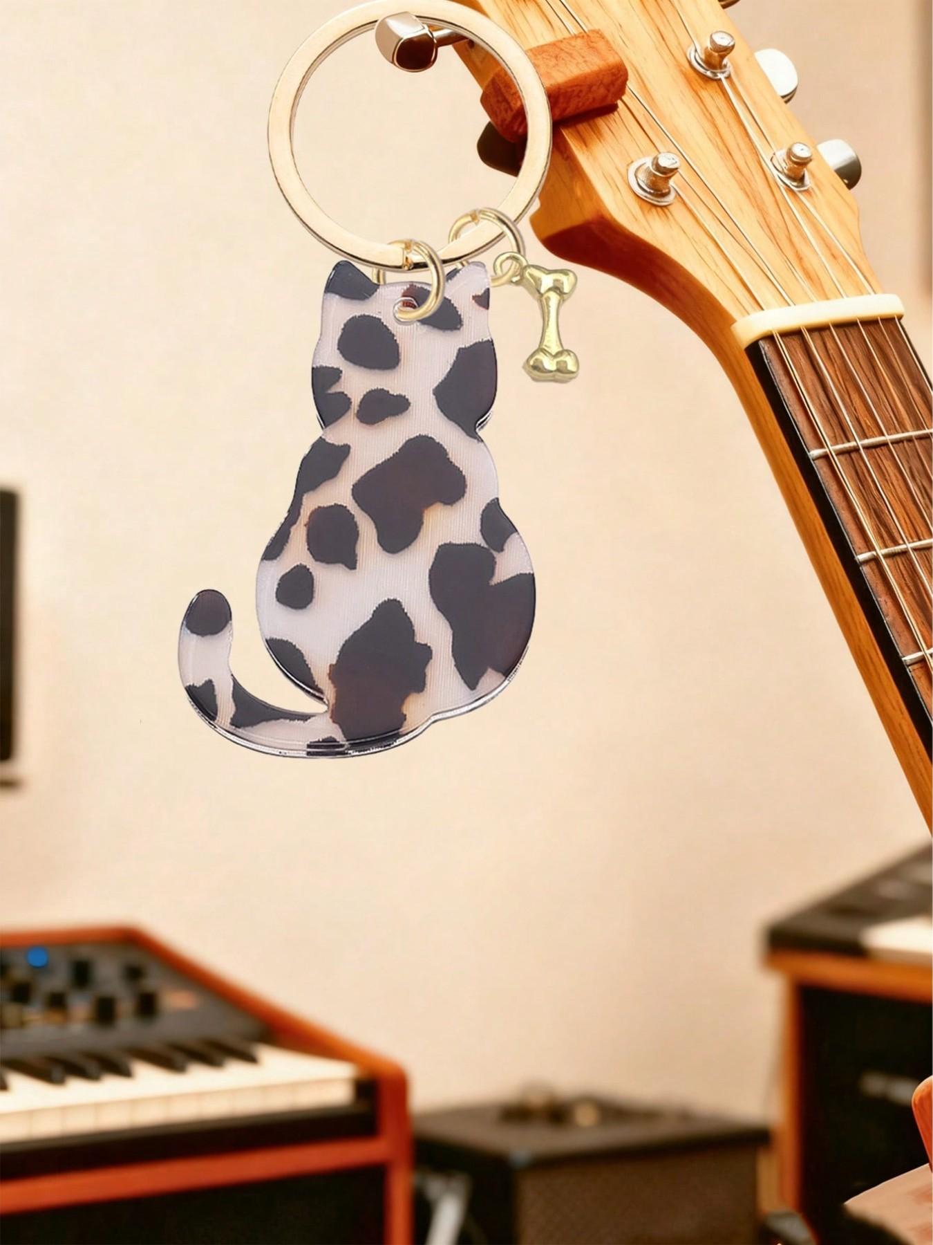Double-sided acrylic leopard print cat and dog bone keychain, a fashionable, classic, and cool animal-themed bag accessory and DIY jewelry component. Can be attached to backpacks, handbags, car keys, house keys, and phone accessories. Versatile Attachment