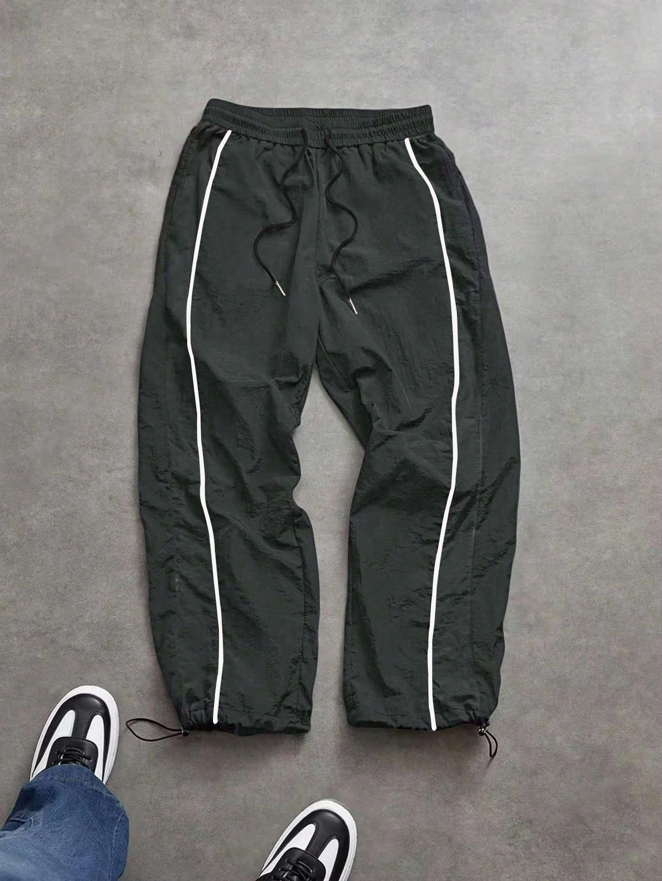 Men's lightweight, breathable, reflective printed wide-leg pants with adjustable leg openings and drawstrings, elastic waist, casual pants suitable for outdoor sports, fitness, campus commuting, street fashion, and versatile long pants