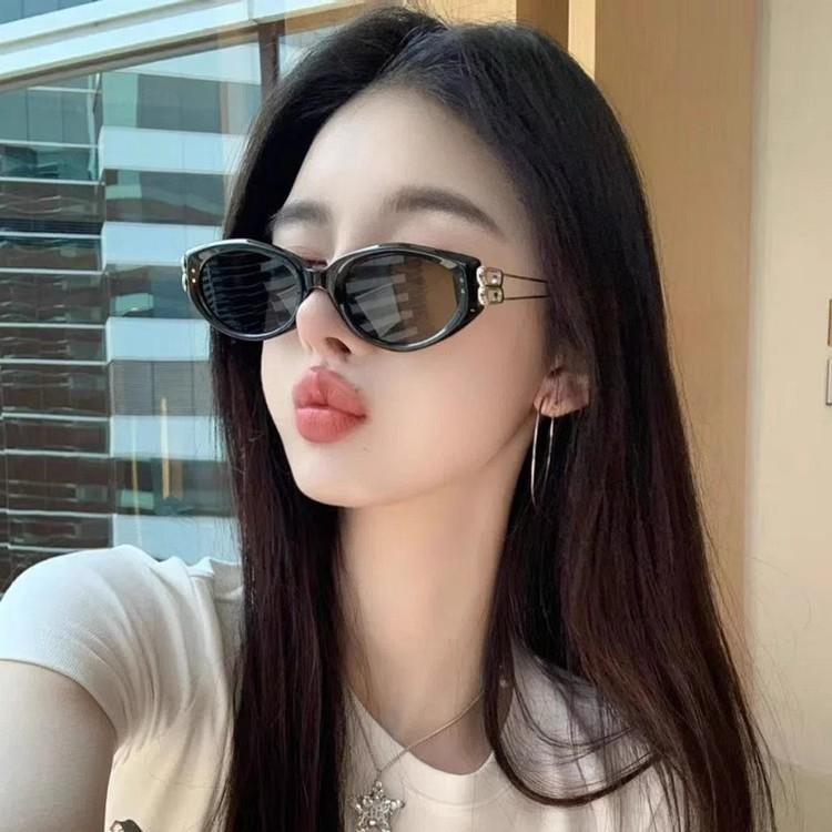 GM sunglasses women's 2026 new oval cat-eye jennie same sunglasses metal temples high-end trend