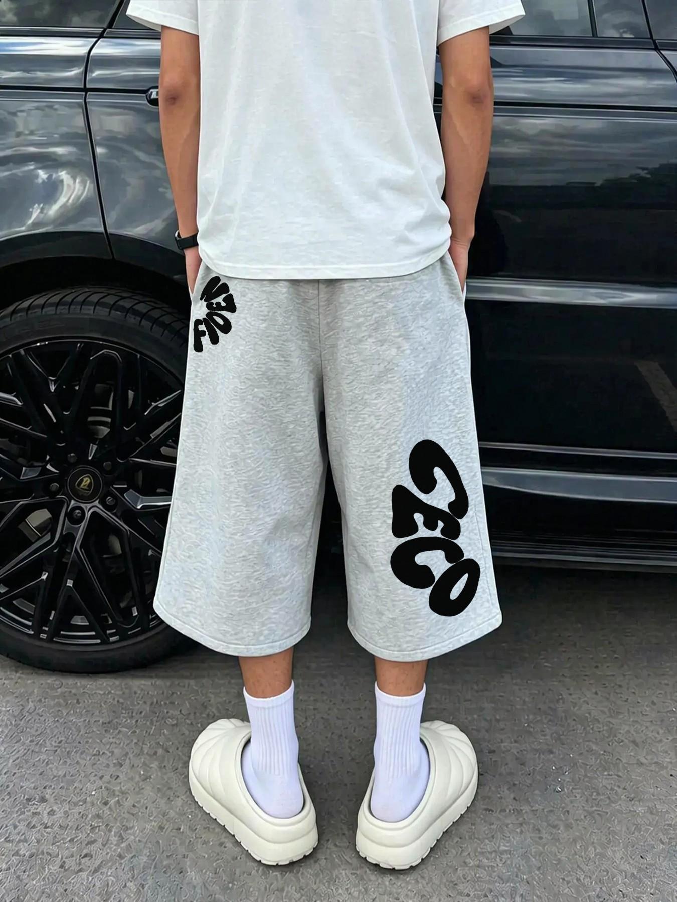 Men Dual Side Curved Bold Letter Print 7 Length Capri Sweat Shorts, Contrast White Drawstring Elastic High Waist Loose Wide Leg Calf-Length Bermuda Bottoms, Y2K Hip Hop Streetwear Jogger Shorts