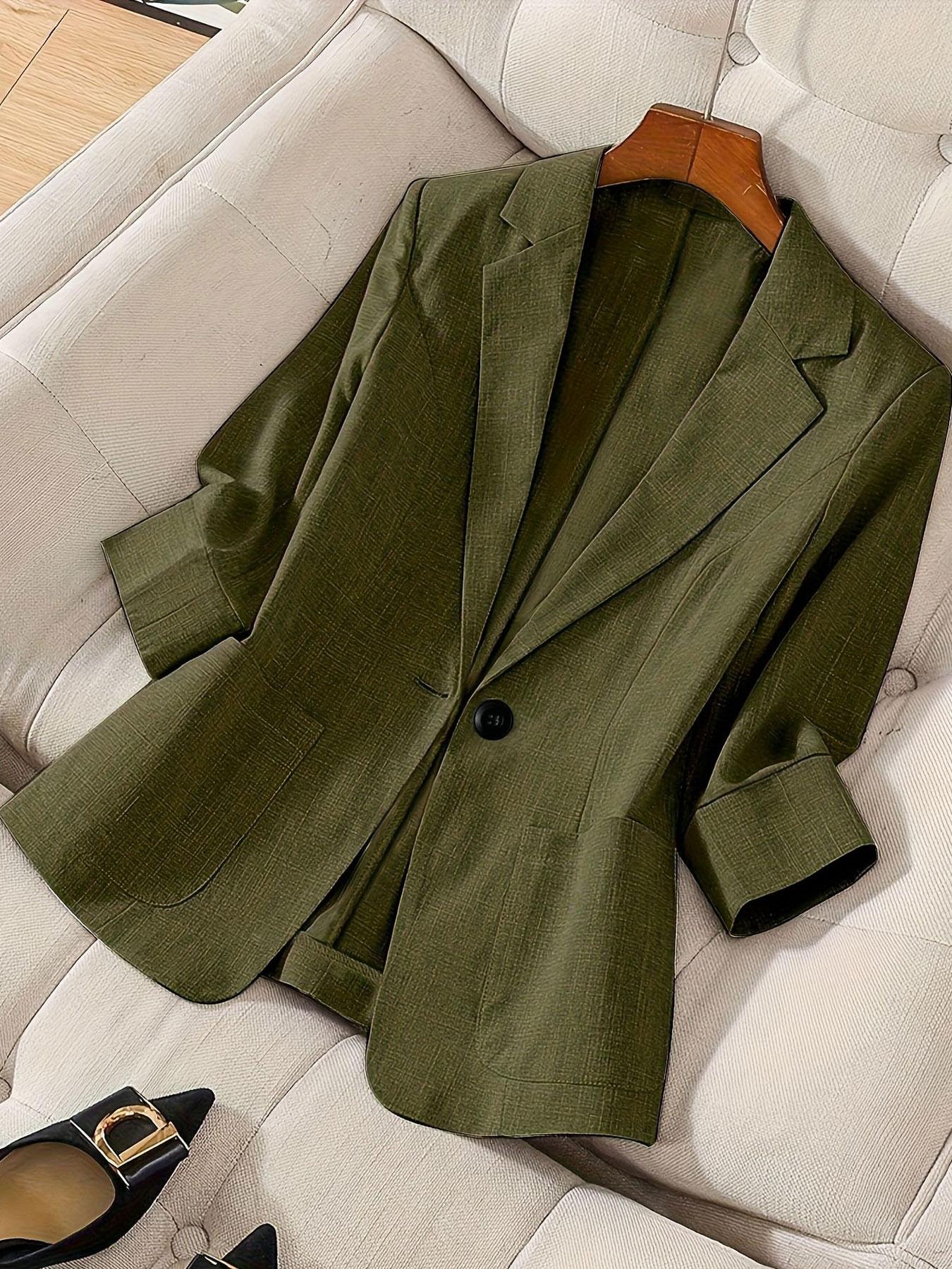 A women's solid color lapel single-breasted single-button mid-length sleeve double-pocket stylish blazer, suitable for spring and summer, appropriate for the workplace and daily wear.