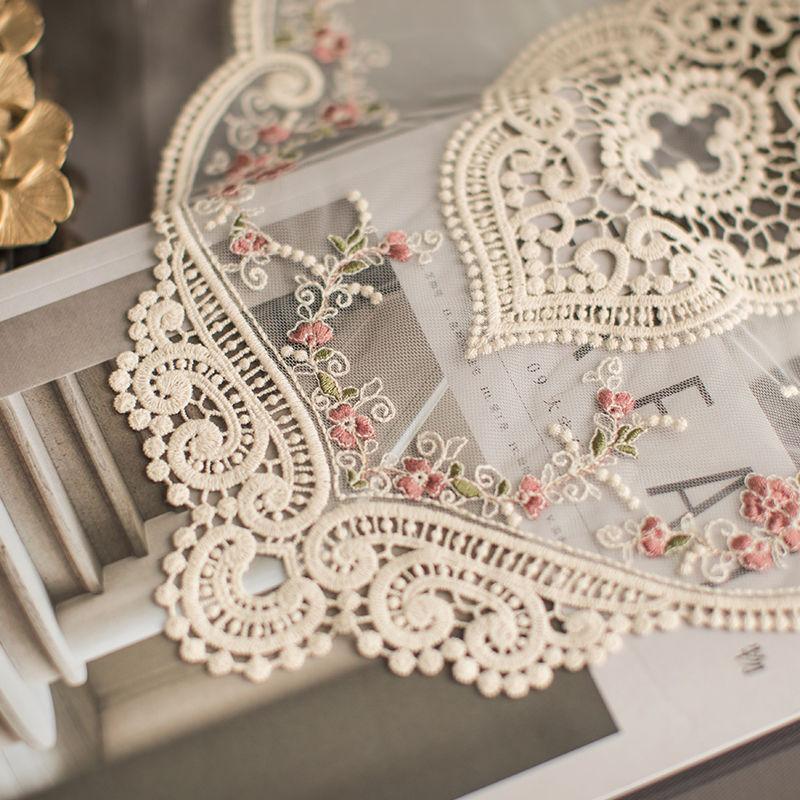 1 piece, a vintage-style handmade crochet round mat with polyester fabric, featuring elegant hollow designs and floral motifs, suitable for weddings, dining utensils, parties, Valentine's Day, Easter, St. Patrick's Day, and carnival celebrations.