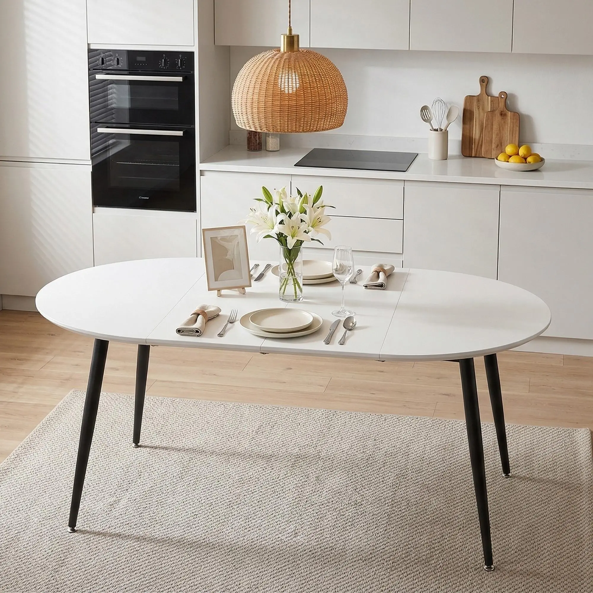 Round Extendable Dining Table for 4-6 People, White MDF Top with Black Metal Legs, Pull-Out Telescopic Mechanism, Modern Space-Saving Kitchen Table, 30in Height
