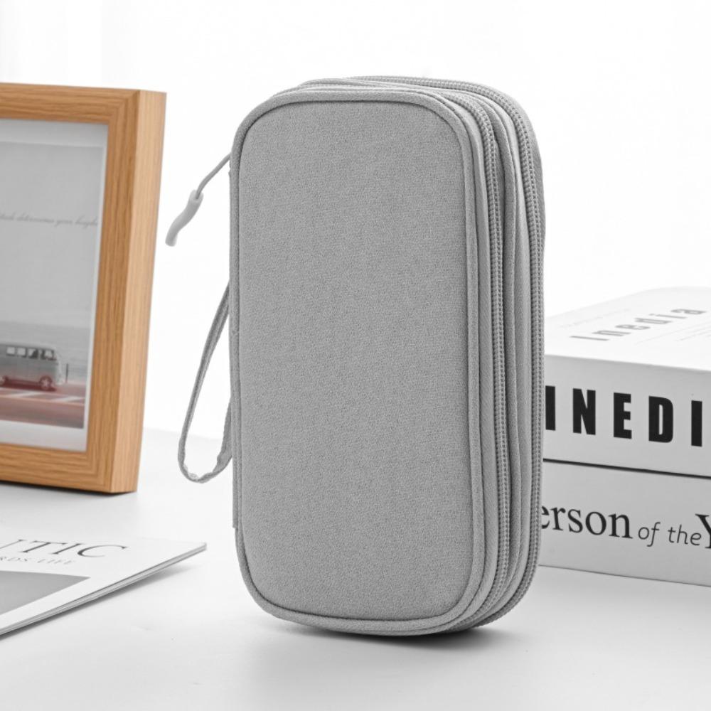 Portable data cable storage bag, double-layer mobile phone charger storage bag, multi-layer grid digital accessory storage bag, compact and convenient travel data cable storage bag