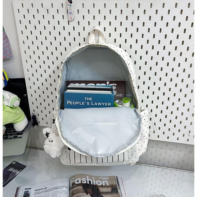 Women's piano-shaped backpack—a cute, polka-dot nylon bag that can be worn as a shoulder bag or backpack. It features an elegant, sweet style with a playful touch, making it perfect for school, commuting, shopping, travel, or as a holiday gift