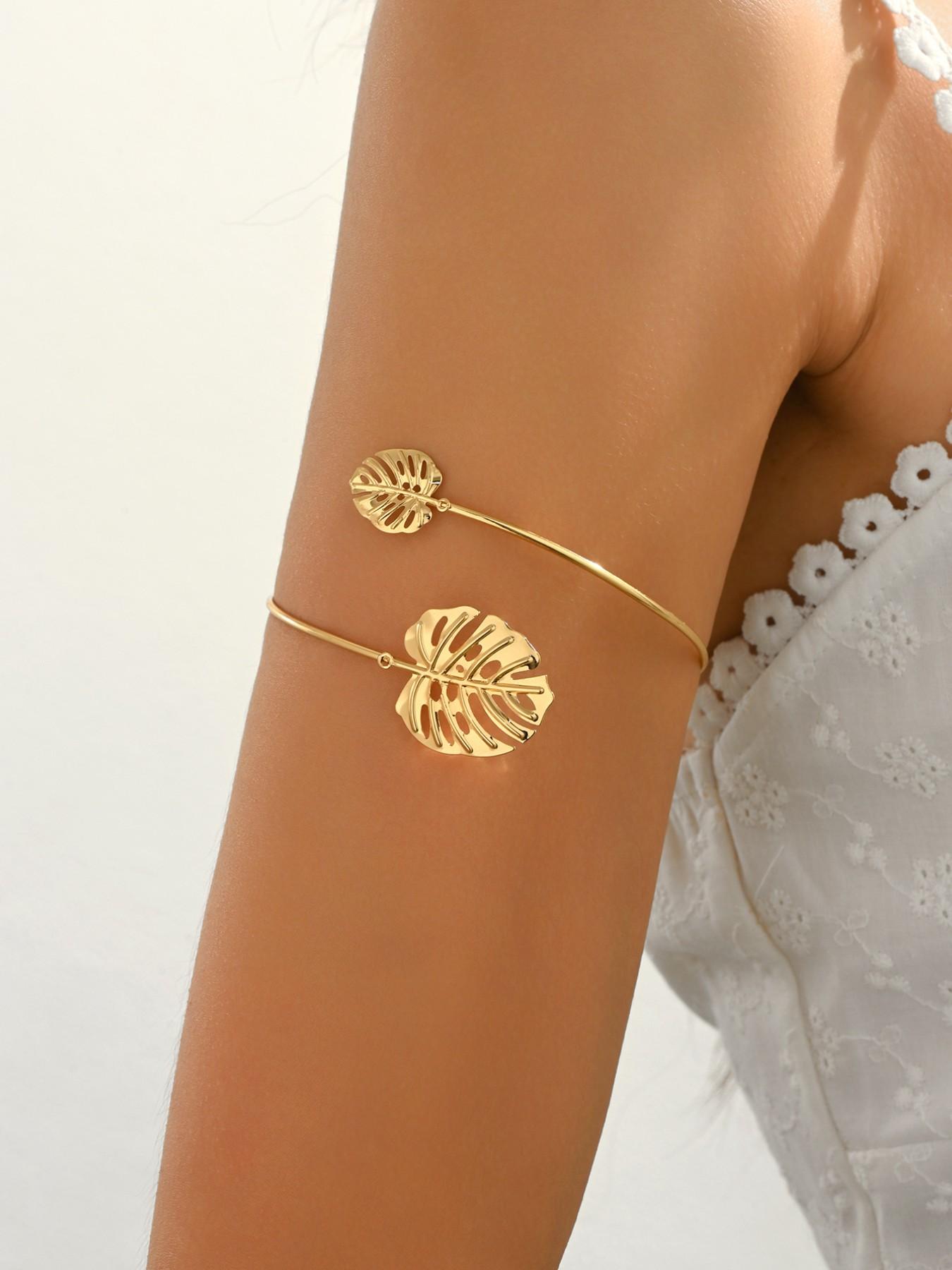 A bohemian-style, fashionable, vacation-inspired, delicately carved leaf-shaped adjustable bracelet/armband. A perfect gift for your loved one, mother, or best friend. Ideal for Valentine's Day, Mother's Day, Women's Day, or Thanksgiving.