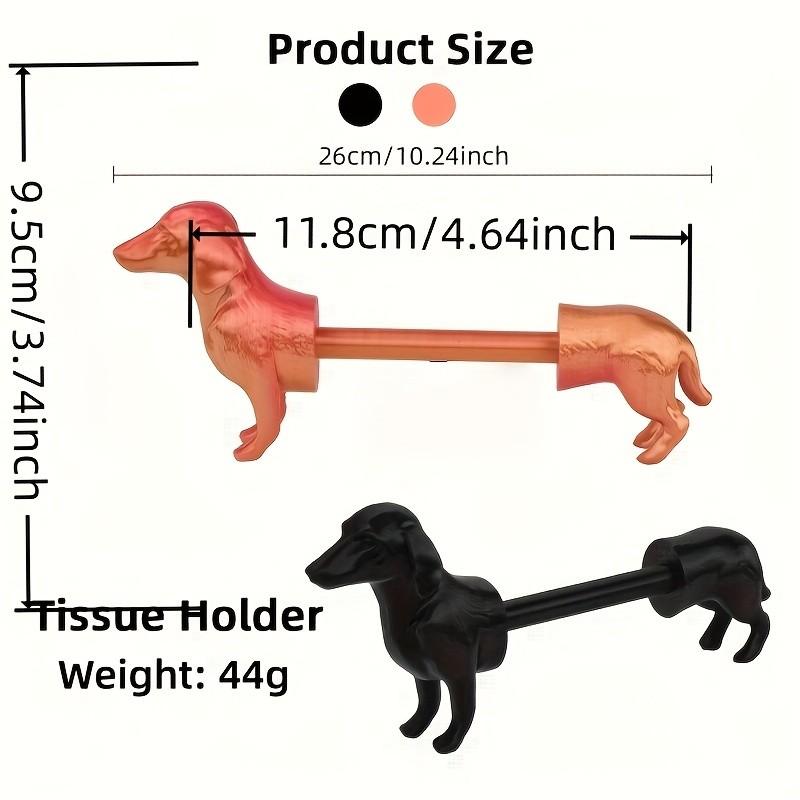 A humorous sausage dog-themed toilet paper holder - an independent black roll holder featuring a cute dog design, made of sturdy plastic and also suitable for kitchen paper towels