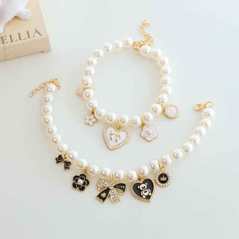 Pet Pearl Necklace Collar |   Vintage Luxury Bow & Camellia Pet Jewelry Pet Collar |   Pearl Necklace Collar for Cats & Dogs |   Vintage Luxury Bow |   Heart Charm |   Noiseless Design |   Camellia Decor  Wedding Birthday Party Photo Props |   Fashion Pet