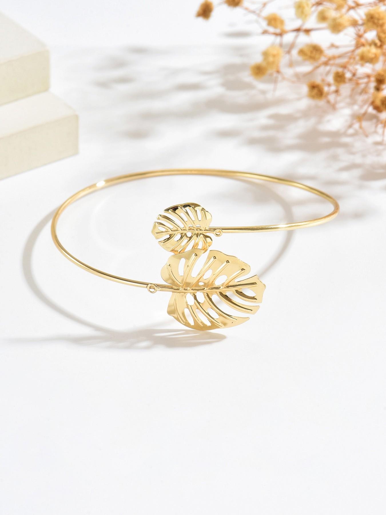 A bohemian-style, fashionable, vacation-inspired, delicately carved leaf-shaped adjustable bracelet/armband. A perfect gift for your loved one, mother, or best friend. Ideal for Valentine's Day, Mother's Day, Women's Day, or Thanksgiving.