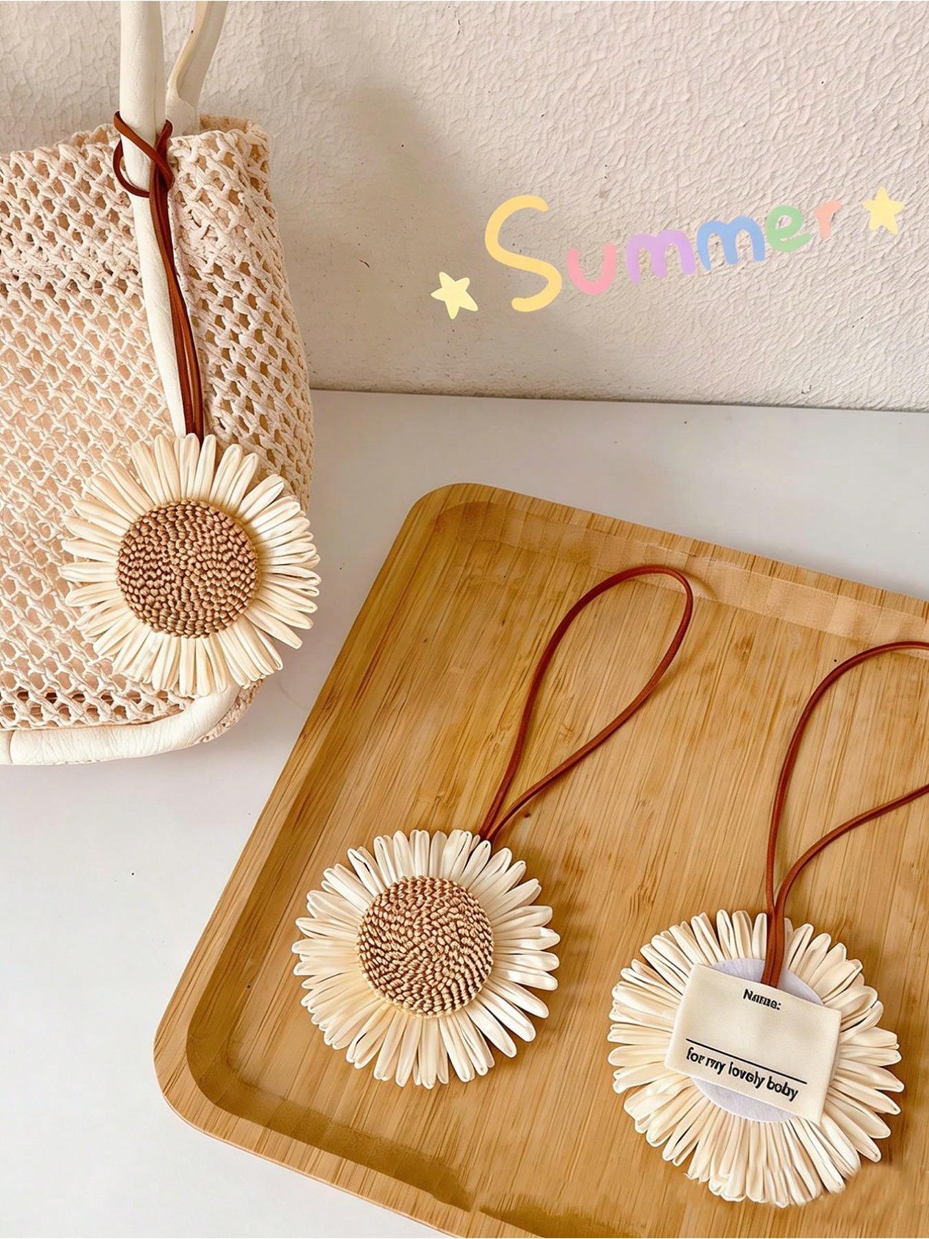 Summer bohemian resort style bag accessories, braided rattan sunflower flower designer pendant. Comes with a genuine leather strap, bohemian beach style accessory for tote bags, wallets, backpacks and keychains, elegant summer decorative pendant.