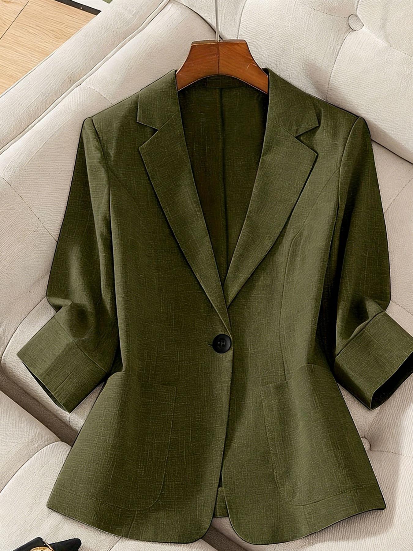 A women's solid color lapel single-breasted single-button mid-length sleeve double-pocket stylish blazer, suitable for spring and summer, appropriate for the workplace and daily wear.
