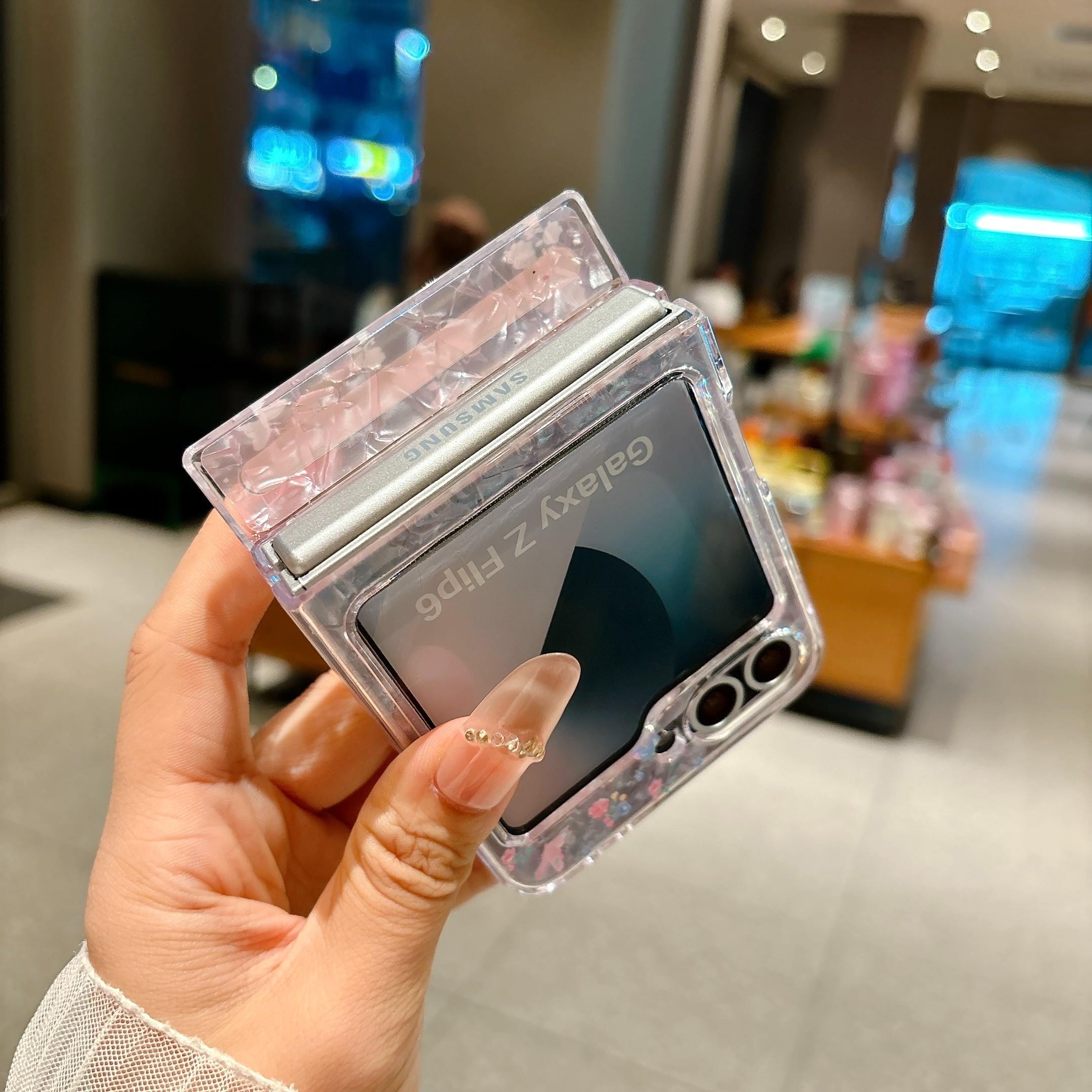 Fresh Floral & Magnetic Snap Shell Pattern Phone Case with optional wrist strap for easy carrying. for Samsung Galaxy Z Flip 5/6/7FE/7. Features a refreshing style, fashionable protection, and unique design perfect for daily use. Protective outer shell.