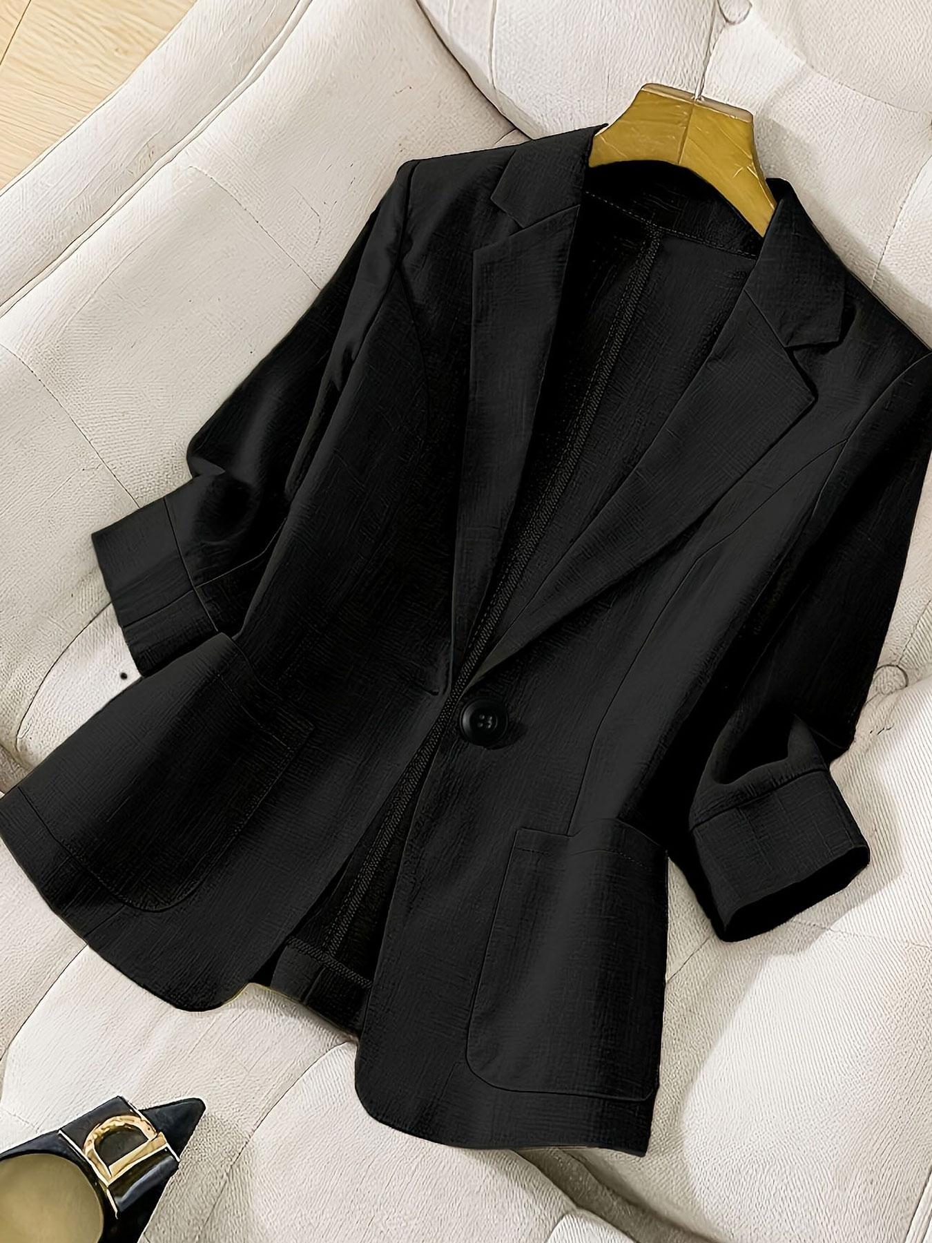 A women's solid color lapel single-breasted single-button mid-length sleeve double-pocket stylish blazer, suitable for spring and summer, appropriate for the workplace and daily wear.