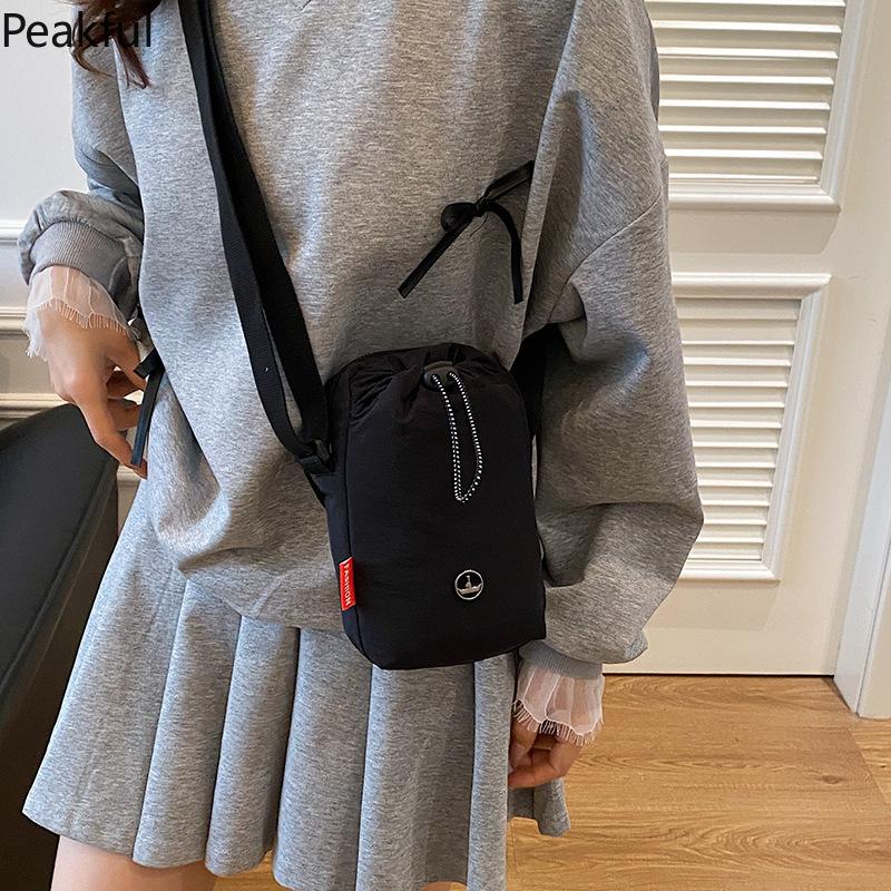 Viral Mini Drawstring Nylon Sling Bag, Fashion Casual Cinch Crossbody Purse, Lightweight Adjustable Strap Shoulder Bag, water-resistant fabric & multi-color options, ideal for travel, gym sessions and everyday hands-free use